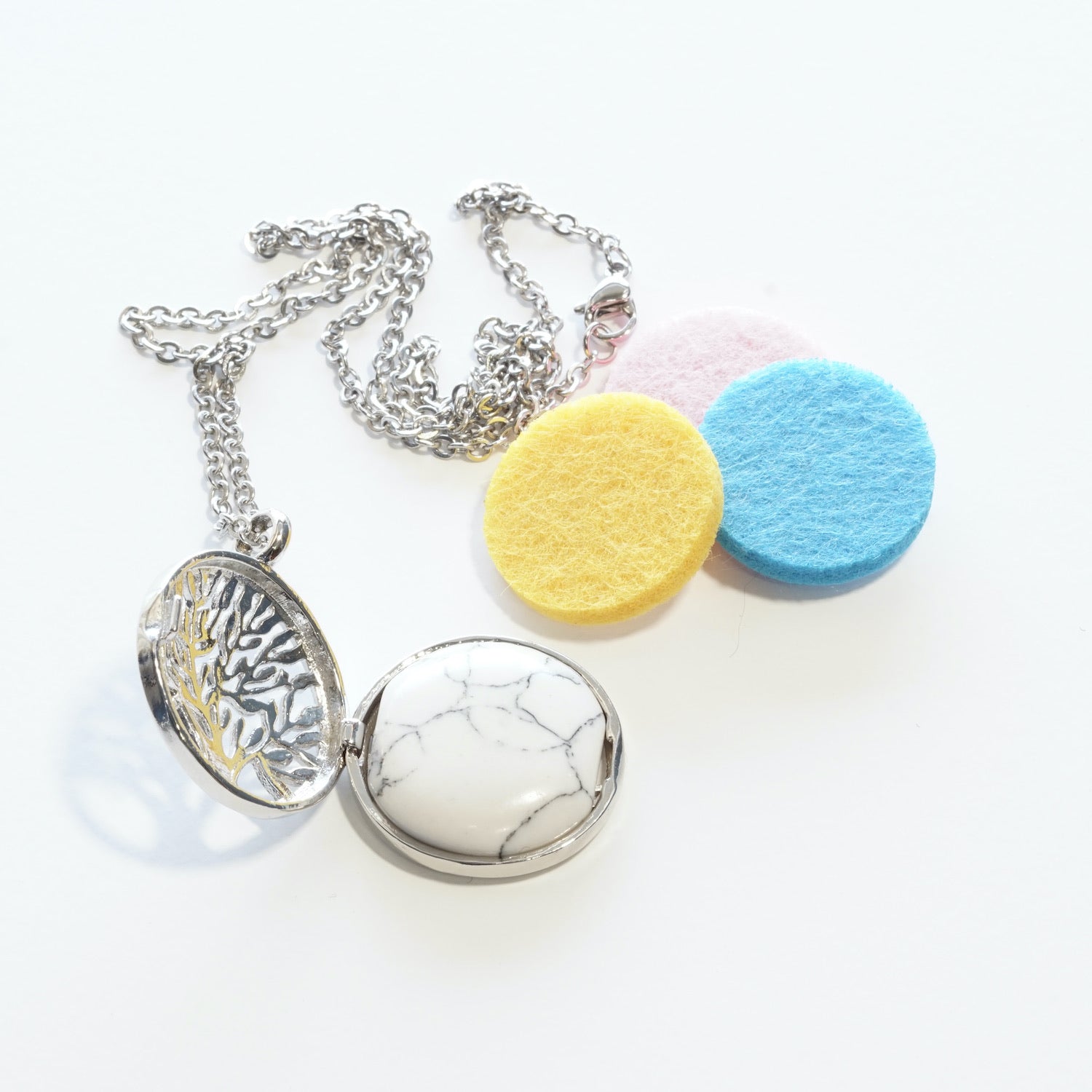 Howlite (synthetic) tree of life diffuser pendant view c