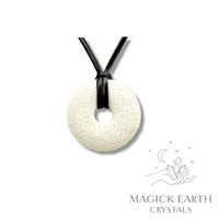 Natural antique white lava donut pendant hanging from a black vegan cord.