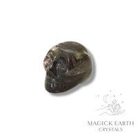 Rhodonite Carved Tiny Skull left view