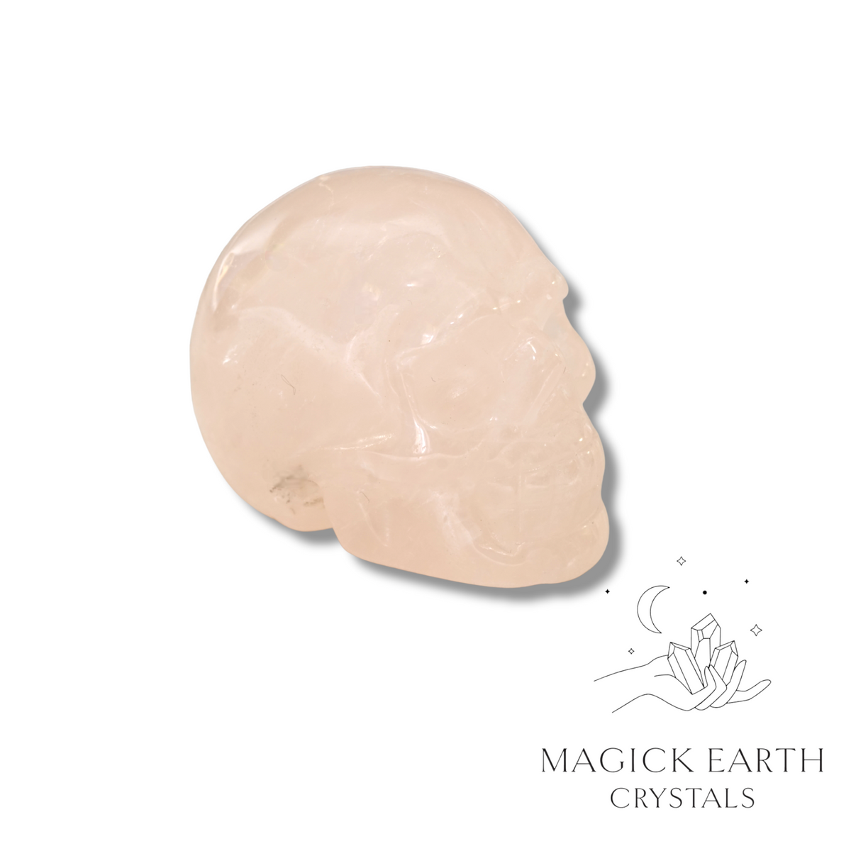 Natural Rose Quartz crystal skull view a