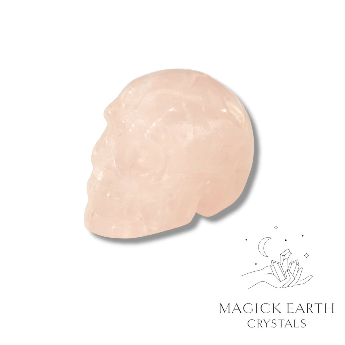 Natural Rose Quartz crystal skull view b