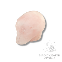 Natural Rose Quartz crystal alien skull view b